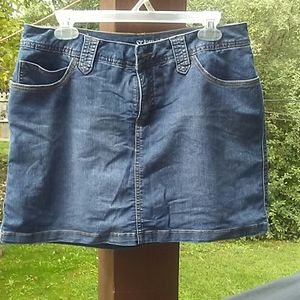 Denim shorts with skirt over.